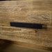 Close up of the black wooden handle on the Victor 7 Drawer Lowboy