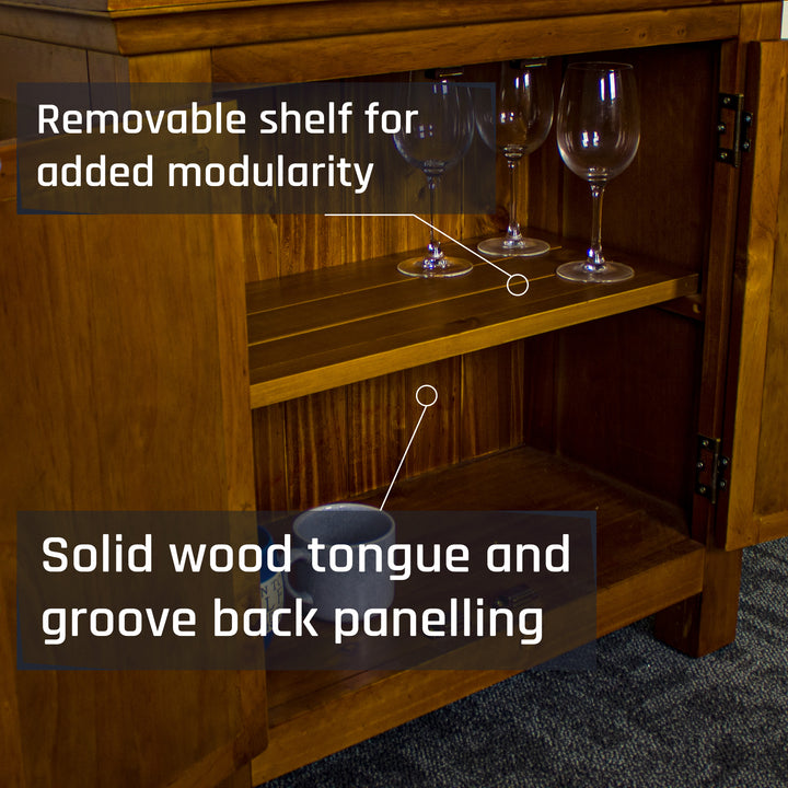 A closer view of the shelving inside the Montreal Compact Pine Buffet. There are three wine glasses on the top shelf and two coffee mugs on the lower shelf.