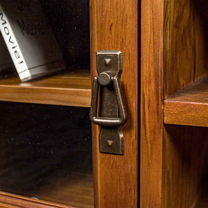 A close up of the hanging style handle on the door of the Montreal Entertainment Unit.