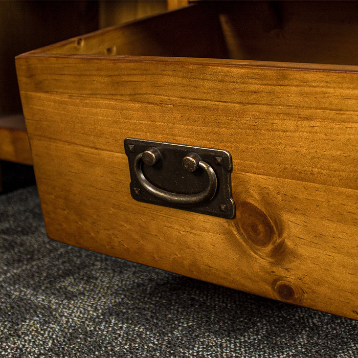 A close up of the hanging handle on the drawer of the Montreal Midsize NZ Pine Buffet.