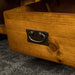 A close up of the hanging handle on the drawer of the Montreal Midsize NZ Pine Buffet.