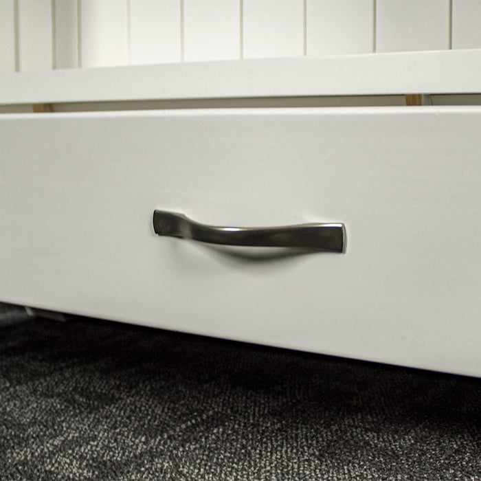 A close up of the silver metal handle on the Felixstowe Large Pine Bookcase