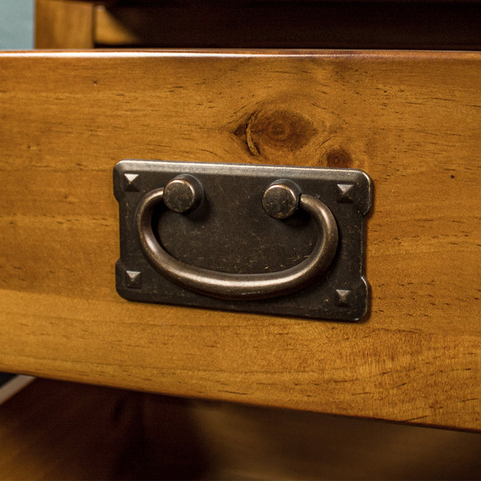 A close up of the handle on the drawers of the Montreal Pine Bedside Cabinet