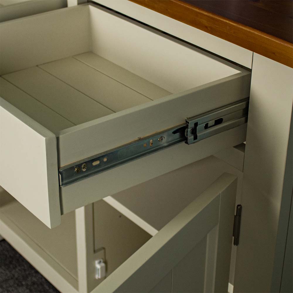 A close up of the metal runners on the side of the drawers on the Alton 2 Door 2 Drawer NZ Pine Buffet.