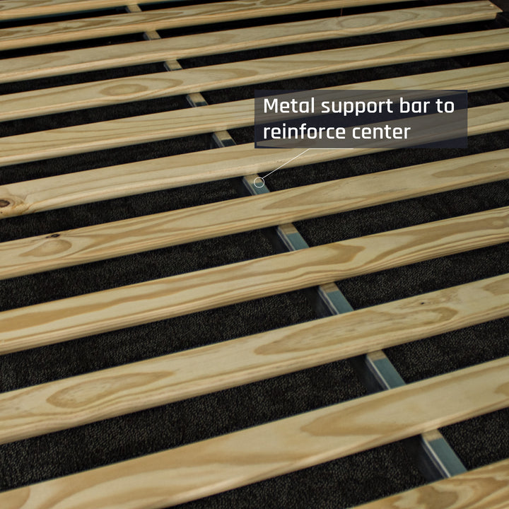 A close up of the metal support beam that runs through the center of the bed frame and underneath the slats.