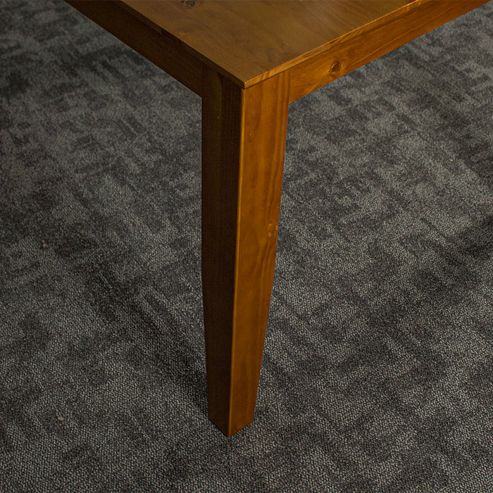 An overall view of the leg of the Hamilton Square Pine Dining Table (1m)