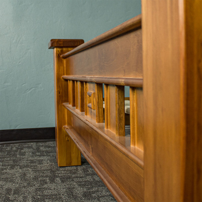 Footboard of the Rimu stained Jamaica King Size Slat Bed Frame