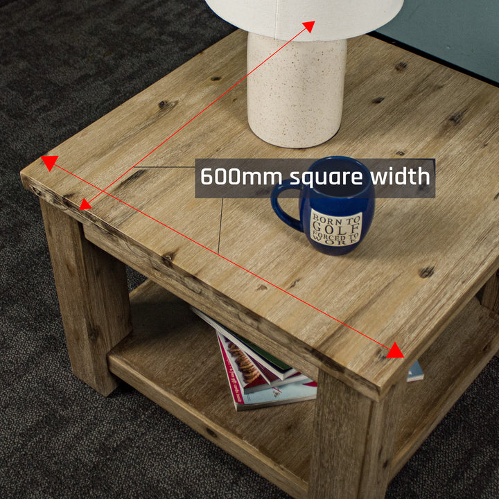 A bird's eye view of the top of the Mars Lamp Table. There is a lamp and a coffee mug on top.