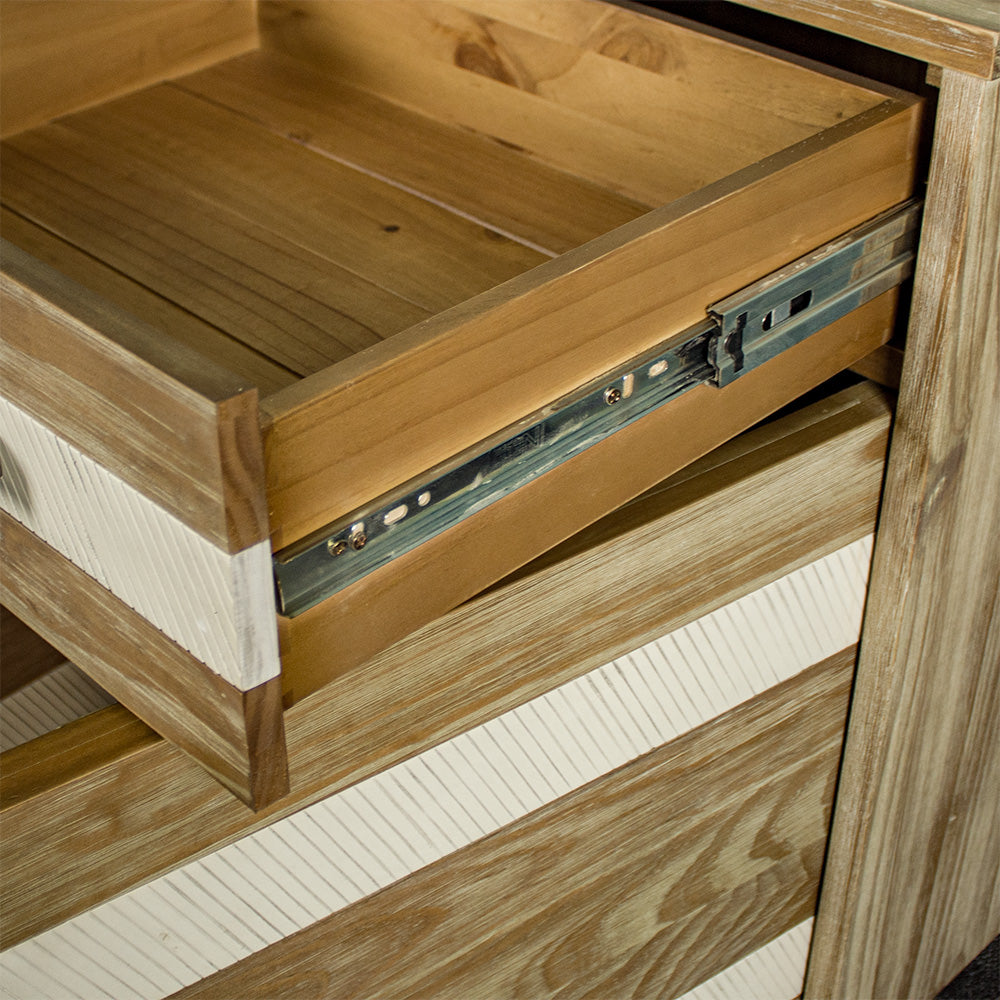 The smooth metal runners on the drawers of the Soho 3 Drawer NZ Pine Large Buffet.
