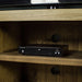 A close up of the cable hole and middle shelving on the Vancouver 2 Door Entertainment Unit / TV Unit.
