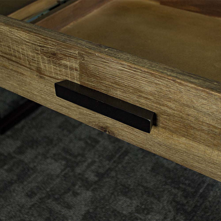 A close up of the black handle on the drawers of the Victor Dressing Table / Desk.