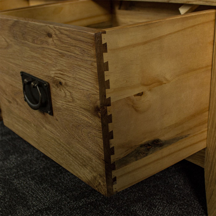 A closer view ofthe dovetail joinery on the drawer of the Vienna Oak Glass DIsplay Cabinet.