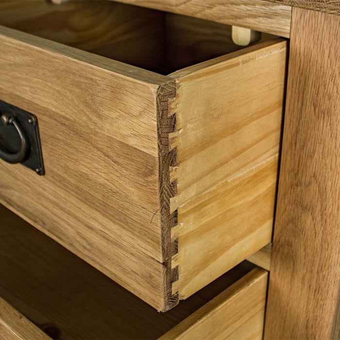 A close up of the dovetail joinery on the drawers of the Yes Five Drawer Oak Chest