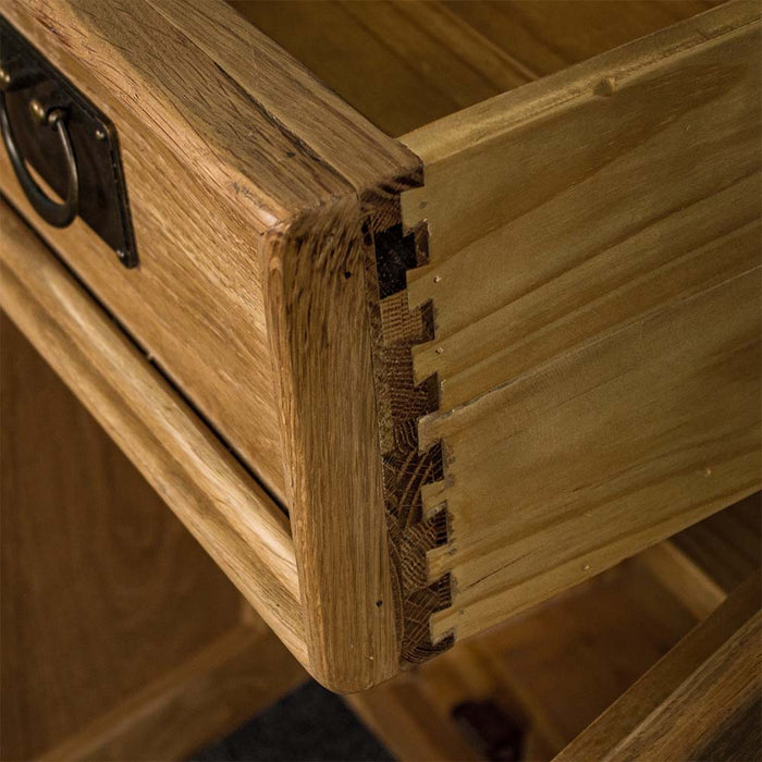 A close up of the dovetail joinery on the Yes 3 Door 3 Drawer Oak Buffet.
