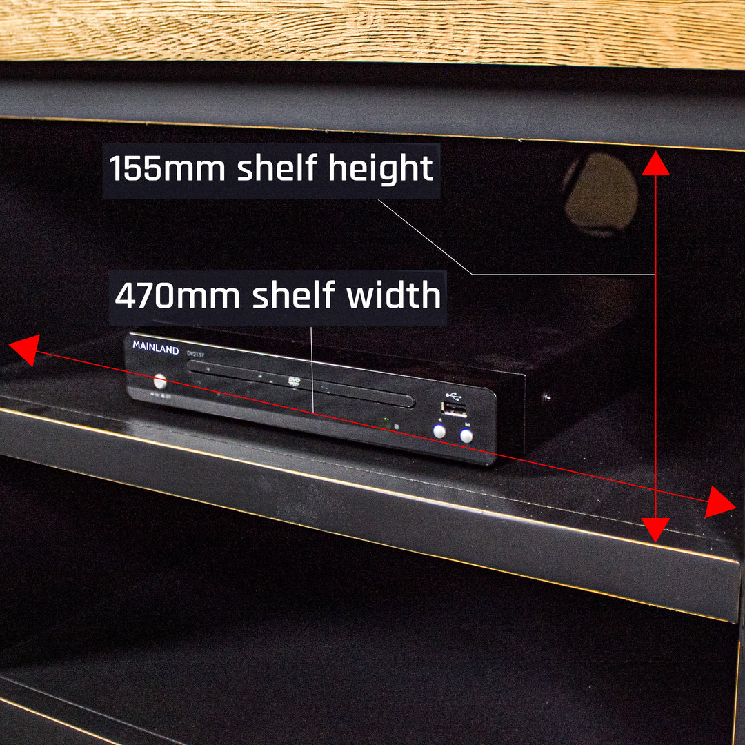 A view of the middle shelves, showing the easy access cable hole. There is a DVD player on the shelf.