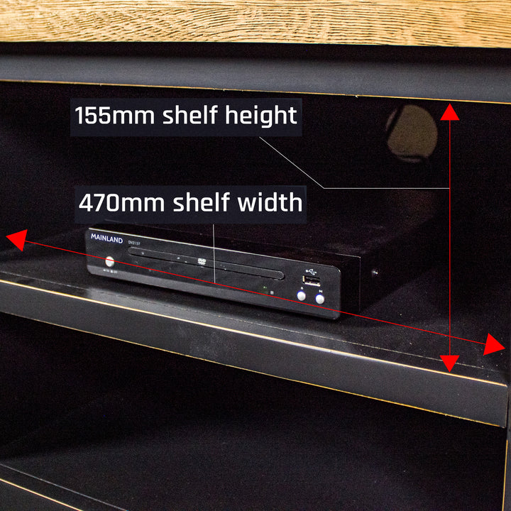 A view of the middle shelves, showing the easy access cable hole. There is a DVD player on the shelf.