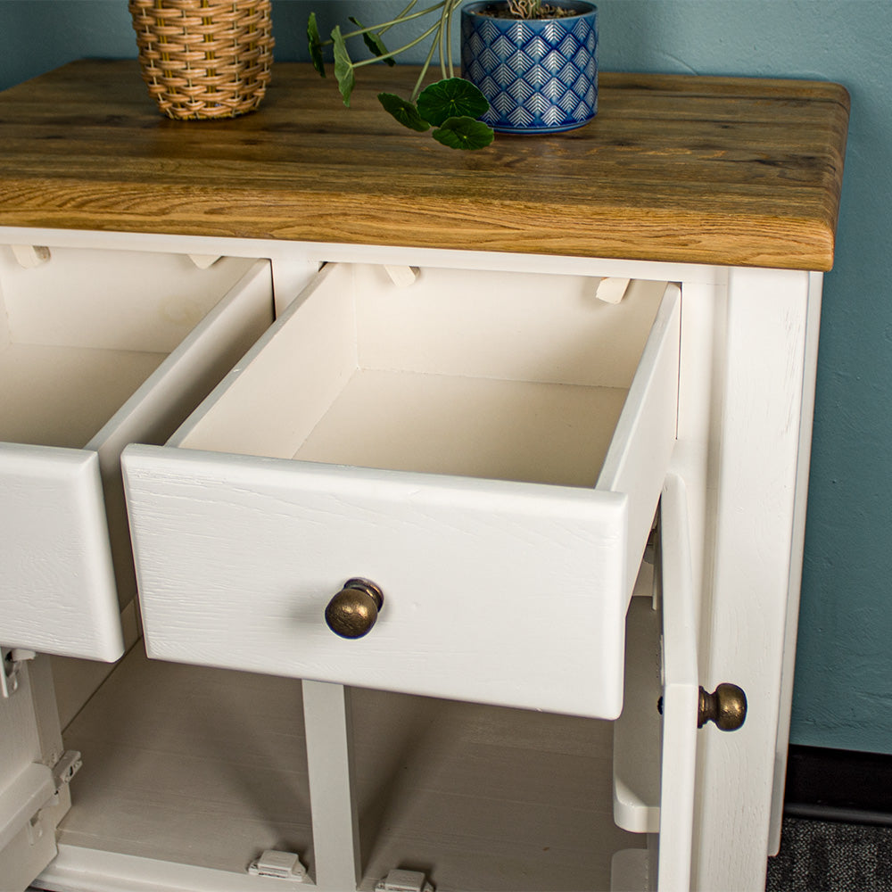 An overall view of the drawers on the Loire Small Oak Buffet.