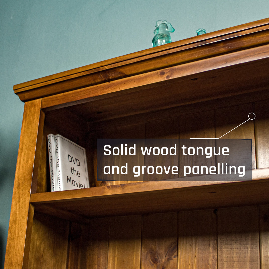 A high angle view of the top shelf of the Montreal Short Pine Bookcase.