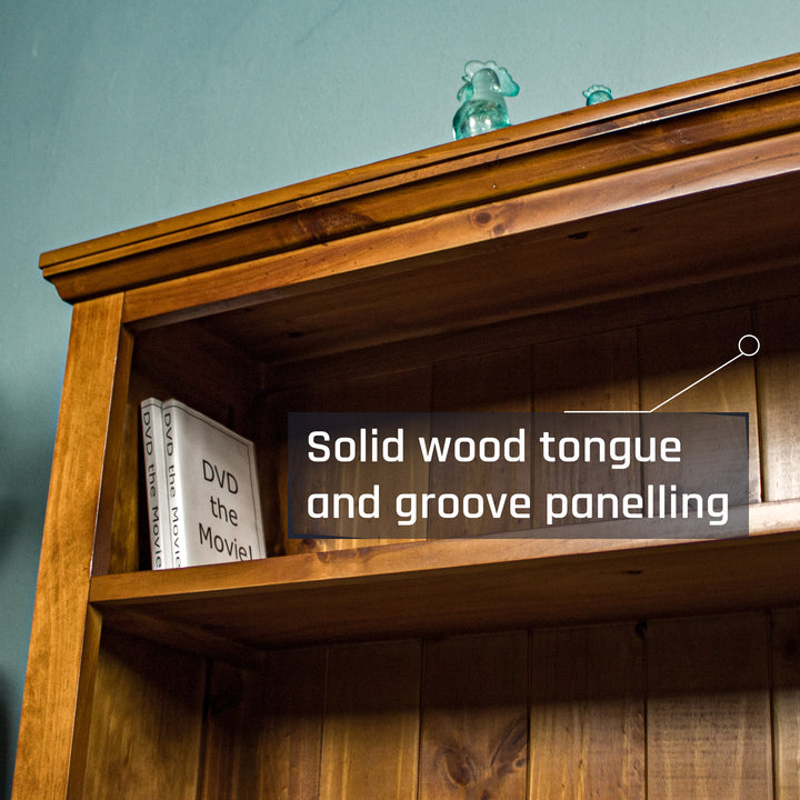 A high angle view of the top shelf of the Montreal Short Pine Bookcase.