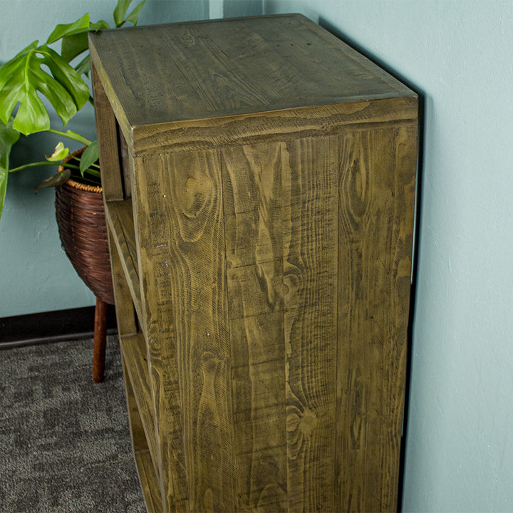 The side of the Stonemill Recycled Pine Cube Shelf, showing the wood planks and grain.