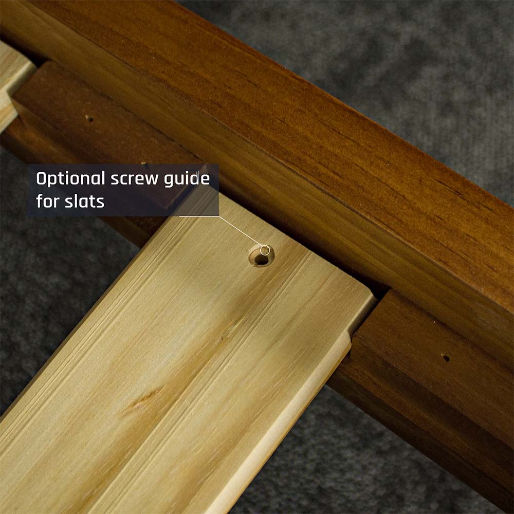A close up of the slats on the Alton Rimu-Stained NZ Pine King Bed Frame.