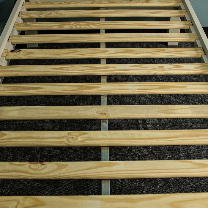 A closer view of the metal support bar that runs underneath the slats of the Alton Single NZ Pine Slat Bed Frame