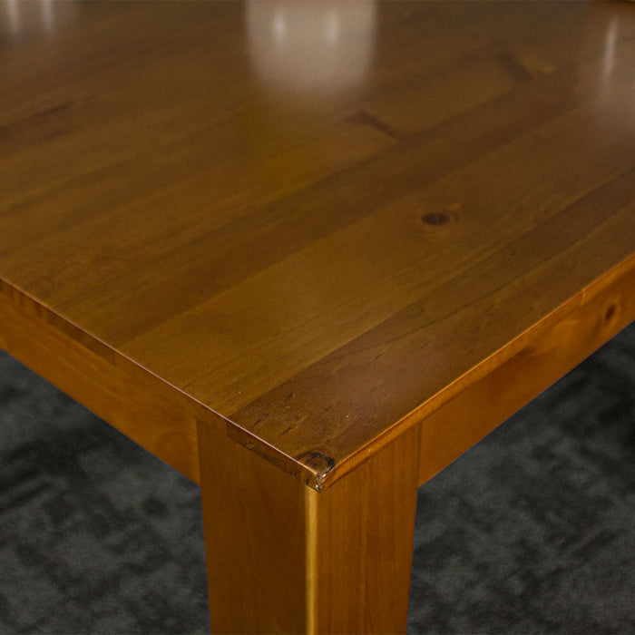 A close up of the top of the Hamilton Square Pine Dining Table (1m)