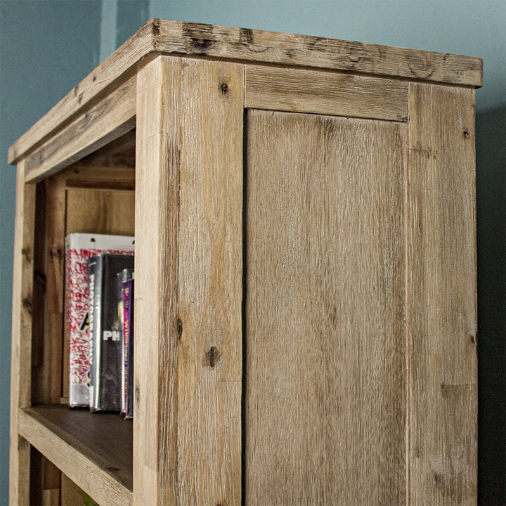 A close view of the side of the Mars Large Bookcase, showing the wood grain and colour.