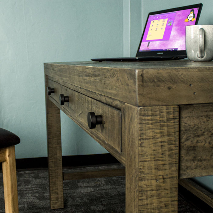 Side of the Stonemill Recycled Pine Desk.