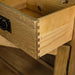 A close up of the dovetail joinery on the drawers of the Vancouver Value 2 Drawer 2 Door Oak Sideboard.