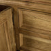 A closer view of the lip/rim of the drawers and doors on the Versailles Large Oak Buffet.