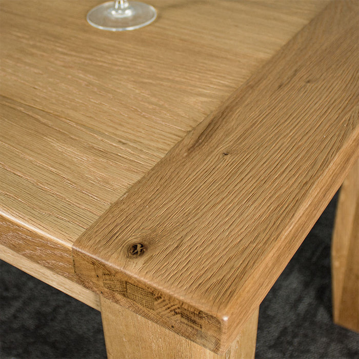 The top of the Yes Oak Dining Table (1.4m), showing the wood grain.