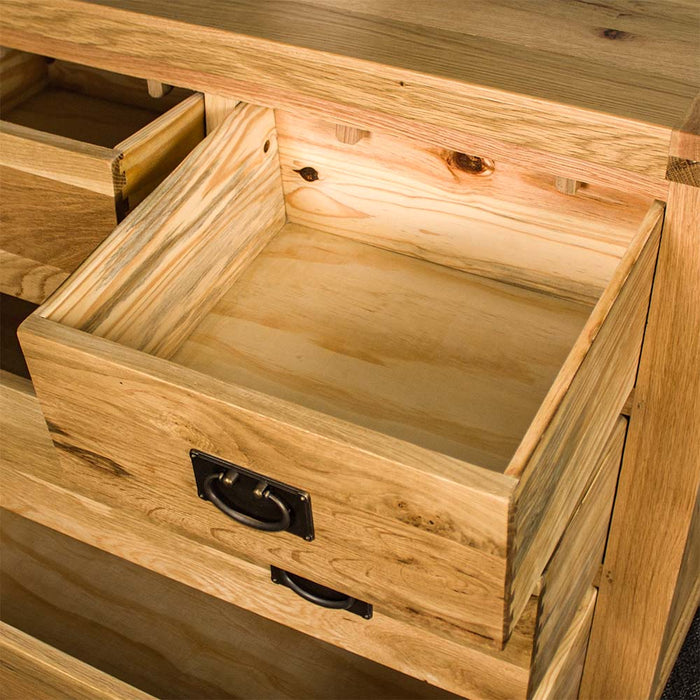 An overall view of the smaller top drawers on the Yes Four Drawer Oak Lowboy.