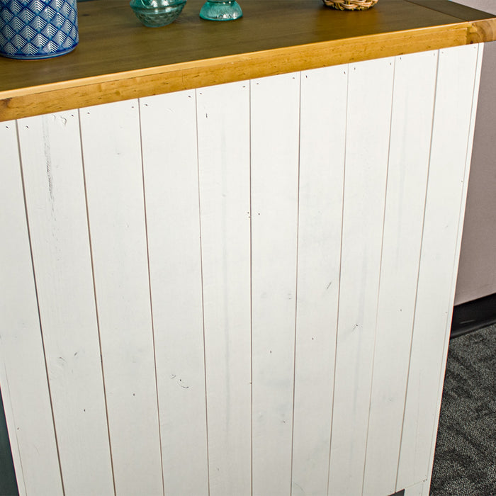 The back of the Felixstowe 5 Drawer Pine Tallboy with tongue and groove panelling.