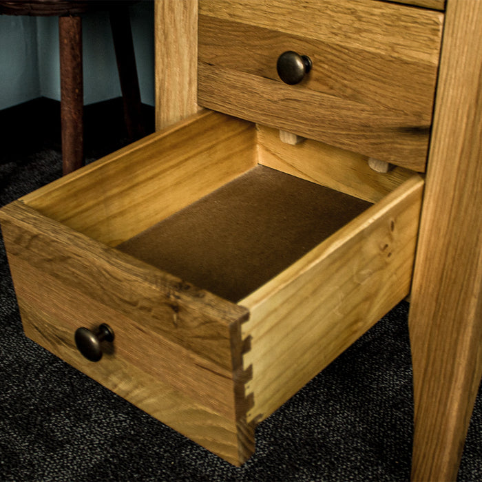 An overall view of the drawers on the Beethoven Oak Bedside Table with 3 Drawers.