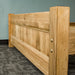 A closer view of the footboard on the Amalfi Super King Oak Bed Frame.