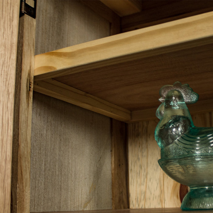 A view of under the shelf on the Yes Oak Display Cabinet.