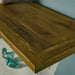 Rimu stained top of the Byron Recycled Pine Console Table