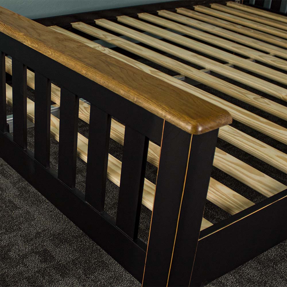 The footboard of the Cascais Oak Top Double Bed Frame.