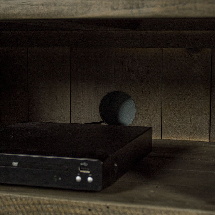 A close up of the easy access hole in the back of the Stonemill Recycled Pine TV Unit which allows cables to pass through.