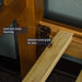 A close up of the bolts that securely hold the Trent Single Size NZ Pine Slat Bed Frame in place.