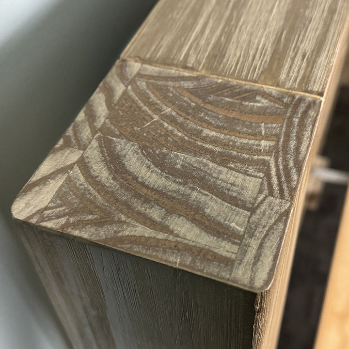 A close up of the top of the Vancouver Queen Size NZ Pine Slat Bed Frame, showing the wood grain and colour.