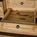 An overall view of the smaller middle drawer on the Versailles Oak 7 Drawer Chest.