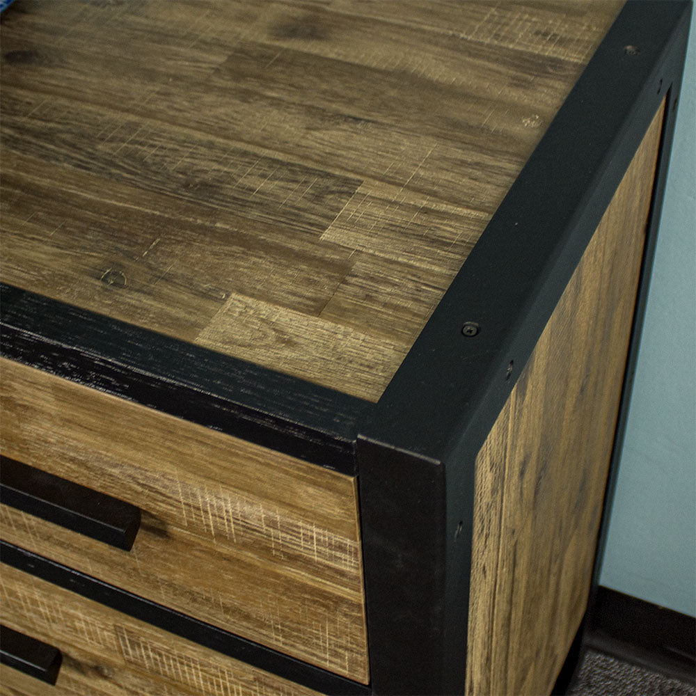 Close up of the top of the Victor 7 Drawer Lowboy, showing the brushed black metal aluminium frame and black painted wood outlines.