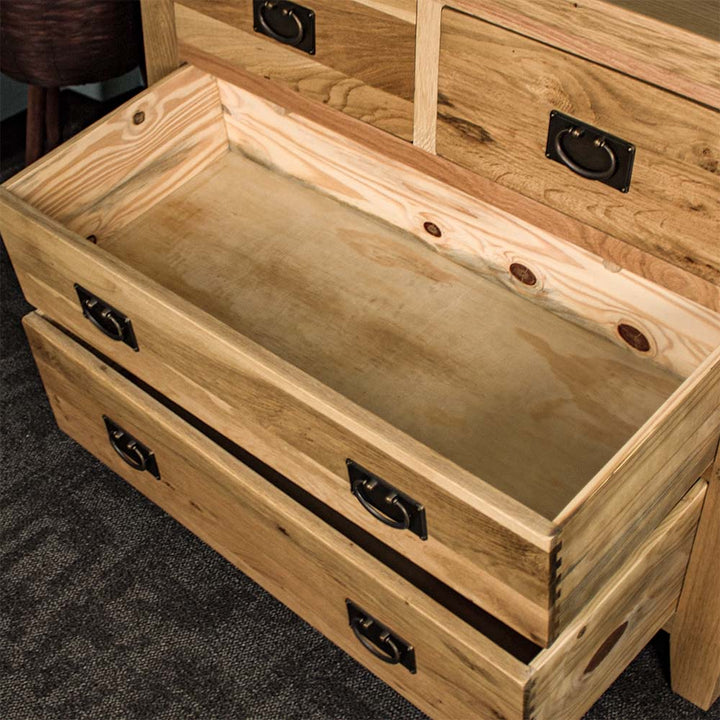 An overall view of the larger drawers on the Yes Four Drawer Oak Lowboy.