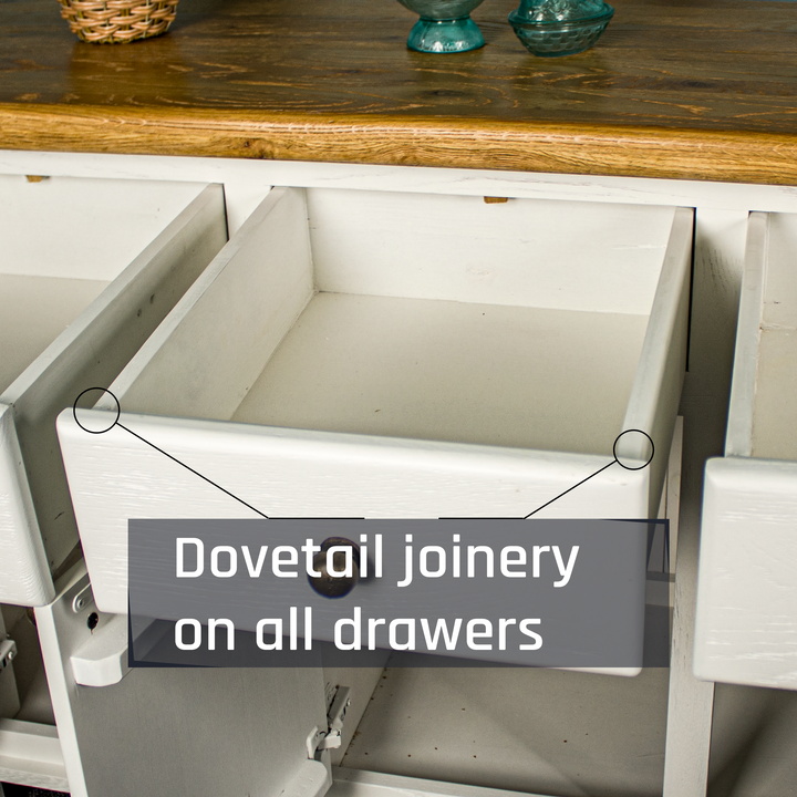 An overall view of the drawers on the Loire Two-Tone Medium Oak Buffet.