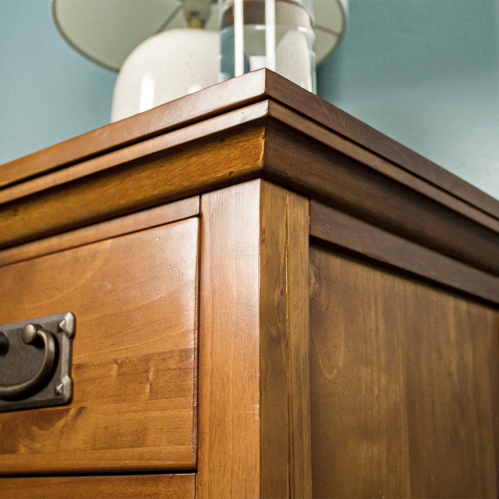 A close up of the edge of the Montreal Pine Bedside Cabinet.