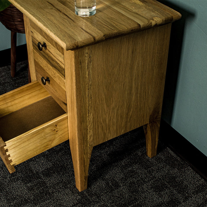 The side of the Beethoven Oak Bedside Table with 3 Drawers.