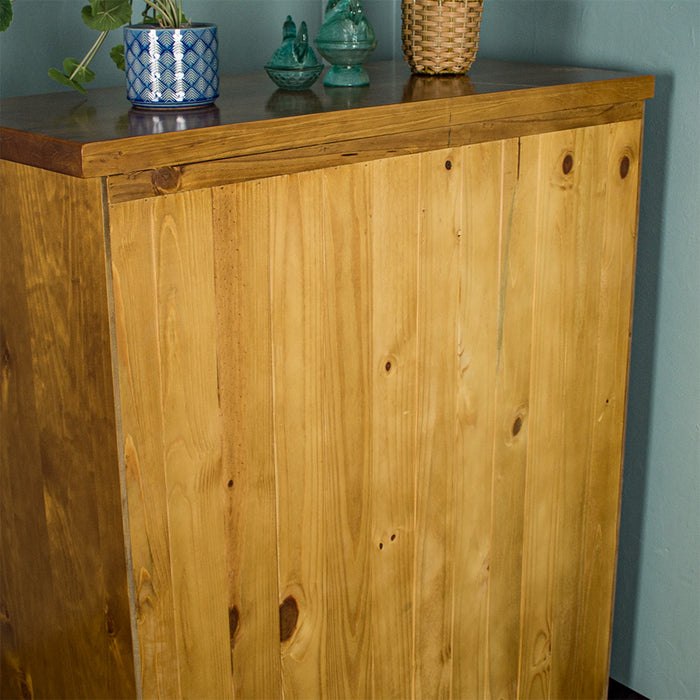 Back of the Jamaica 6 Drawer Pine Tallboy which is solid wood.