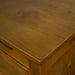 A close up of the top of the Montreal Pine Blanket Box, showing the wood grain and rimu stain.